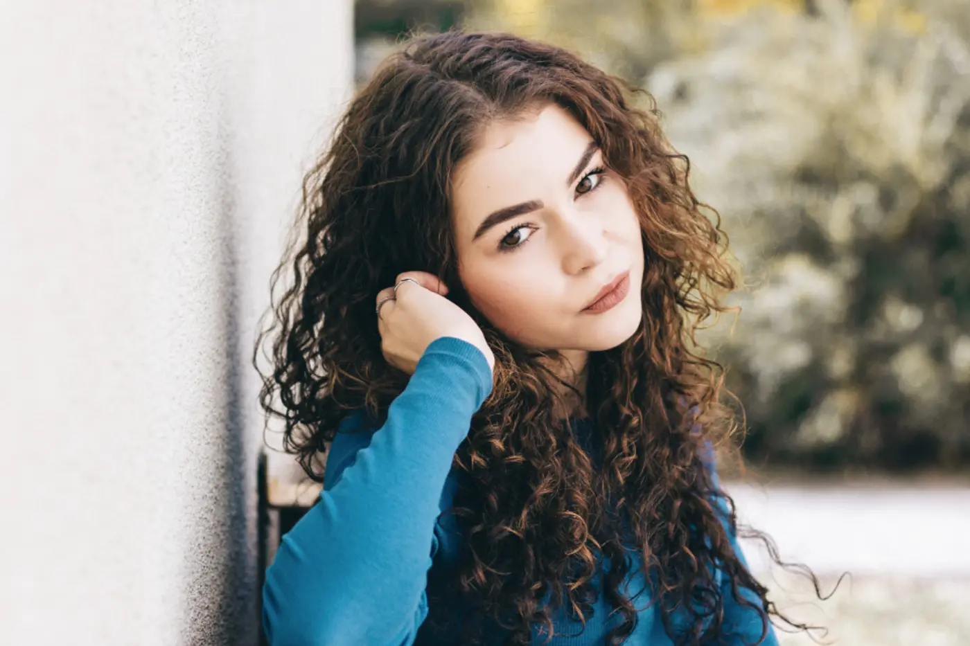 Woman with long curly hair