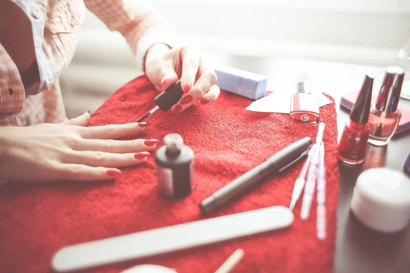 Manicure in progress with nail polish