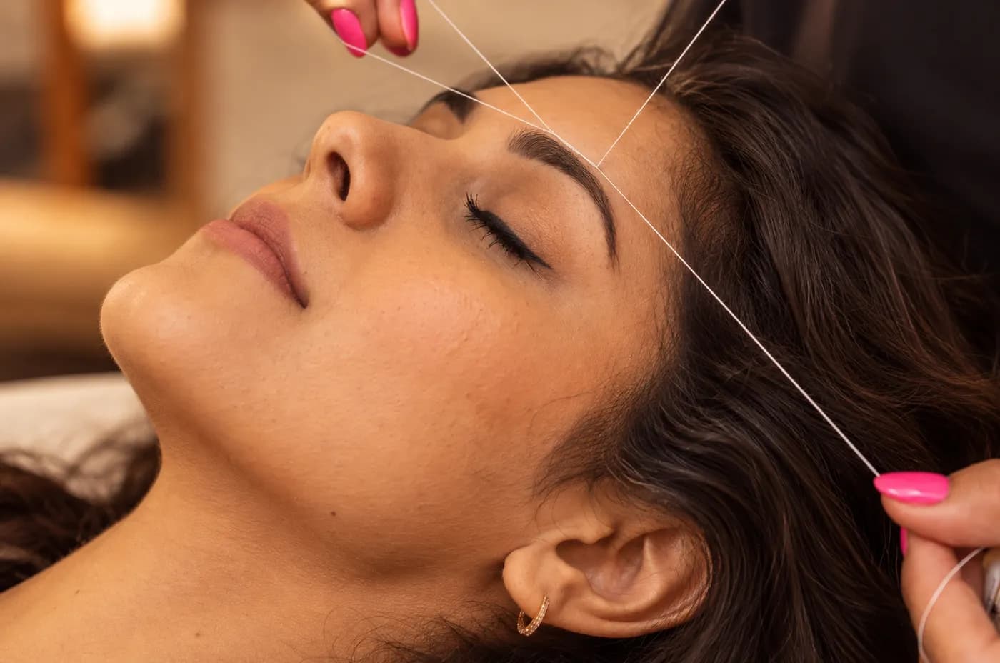 Eyebrow threading